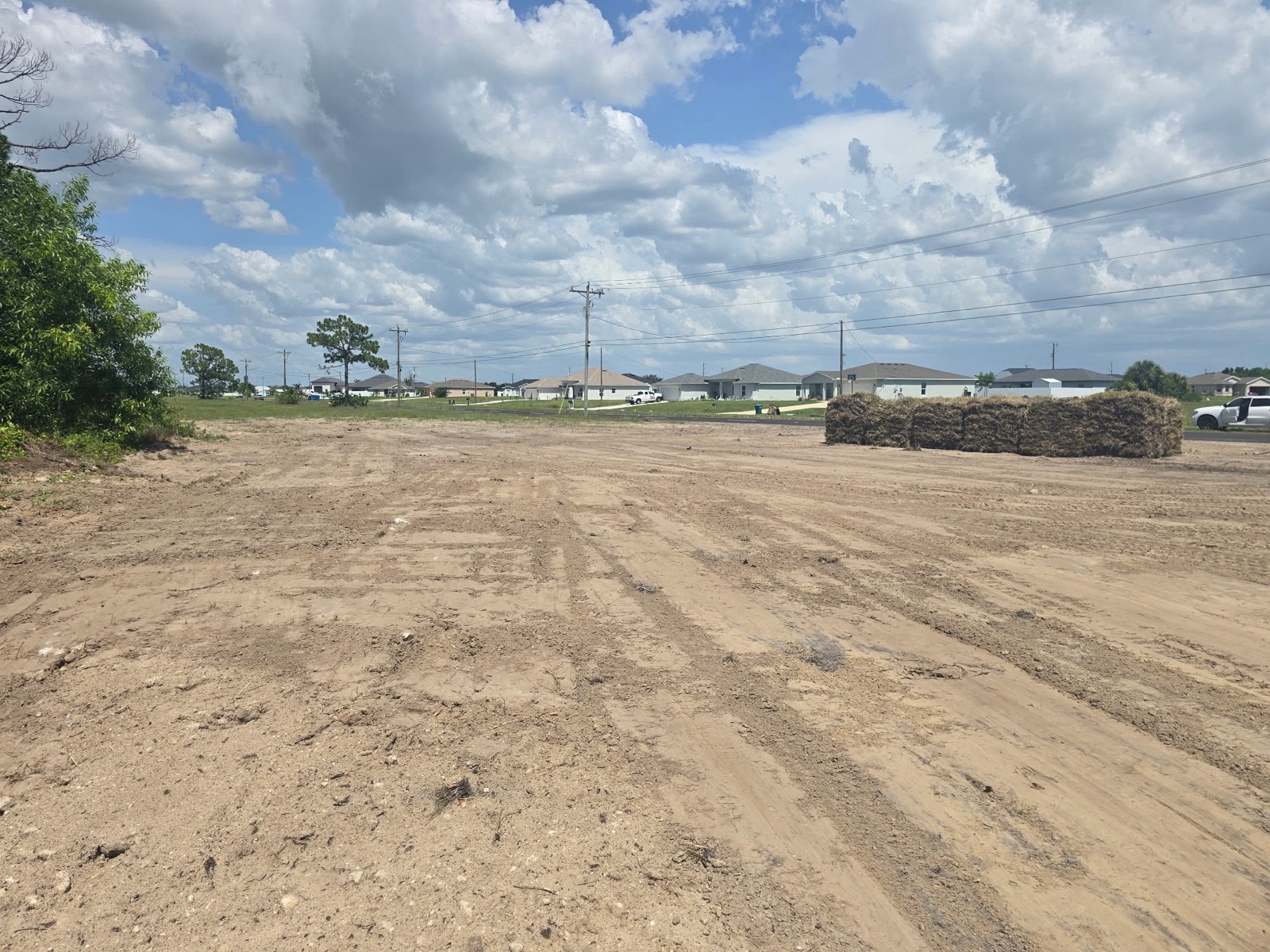 Cleared building lot ready for construction by Moura General Construction
