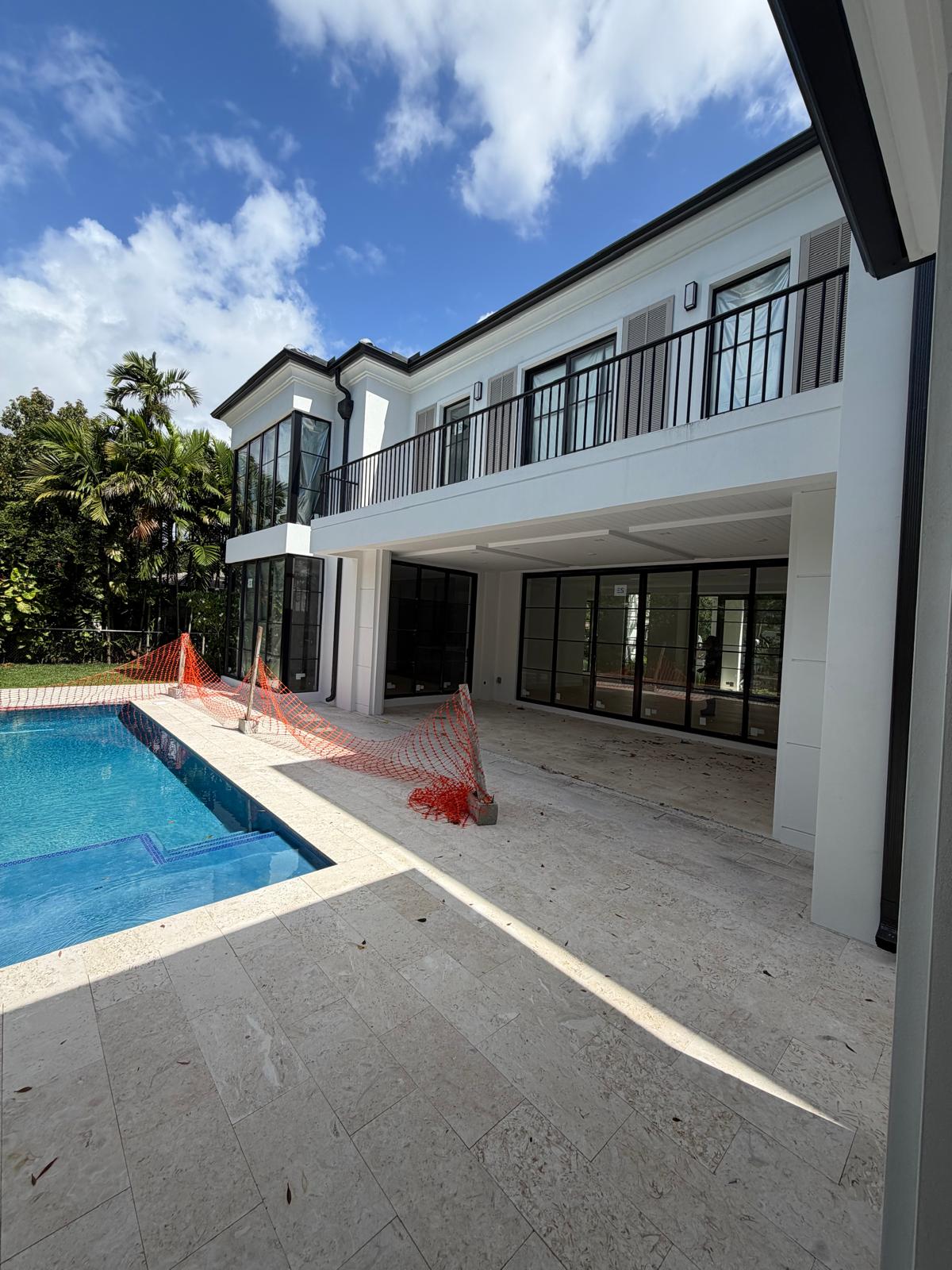 Moura General Construction — pool and rear elevation