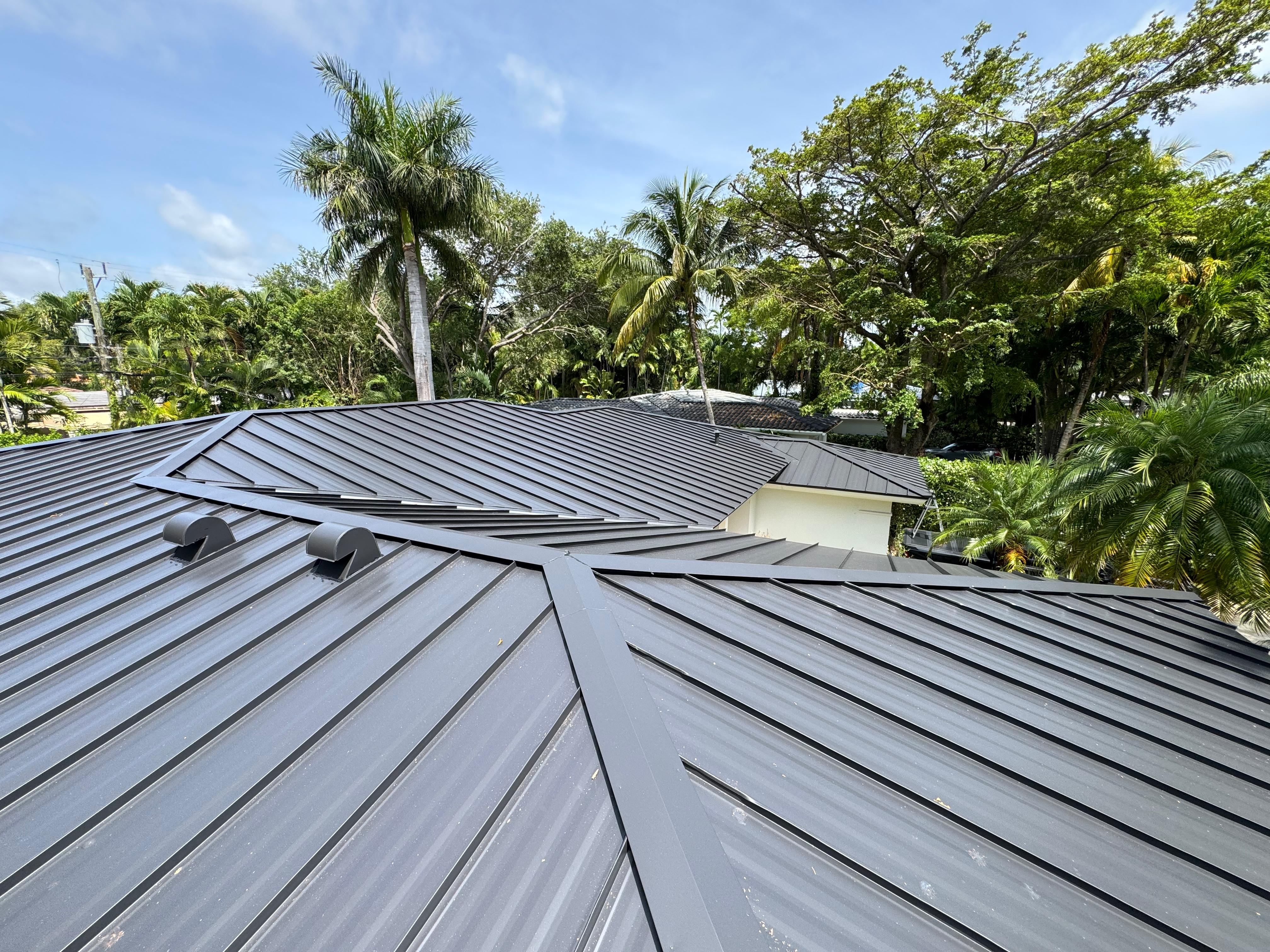 Moura General Construction — metal standing seam roof
